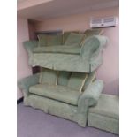 A traditional style three and two seater settees plus matching footstool