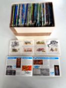 A collection of cigarette cards in albums