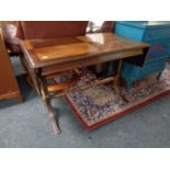 A mahogany flap sided table together with a stool and an elephant plant stand