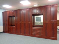 A large reproduction mahogany bedroom suite : multi door wardrobes, dressing table,