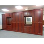 A large reproduction mahogany bedroom suite : multi door wardrobes, dressing table,