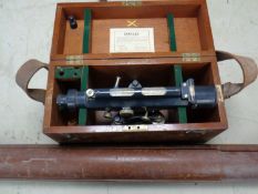 A Stanley surveyor's level in mahogany case with stand