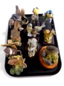 A tray containing assorted animal ornaments to include Heredities hedgehog family,