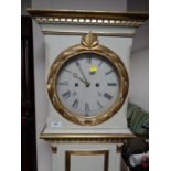 A continental painted longcase clock with pendulum and two weights