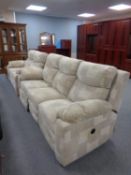 A three piece cloth lounge suite : reclining three seater settee,