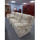 A three piece cloth lounge suite : reclining three seater settee,