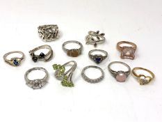 Twelve various 925 silver dress rings.