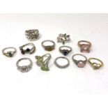 Twelve various 925 silver dress rings.