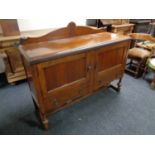 An oak Edwardian sideboard