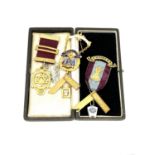 A 9ct gold and enamel Masonic brooch (approximately 28 grams),