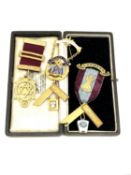 A 9ct gold and enamel Masonic brooch (approximately 28 grams),