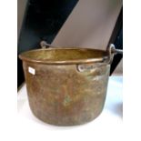 A 19th century copper swing handled cooking pot,
