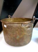 A 19th century copper swing handled cooking pot,