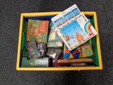 Two crates of puzzles and games