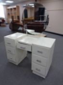 A mid century mirrored dressing table