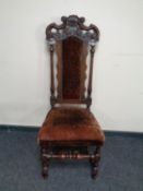 A carved oak barley twist dining chair