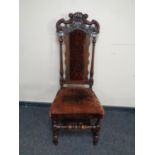 A carved oak barley twist dining chair