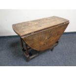 A 19th century oak gateleg table