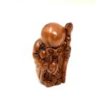 A carved Chinese hardwood netsuke - Village elder with staff