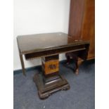An early 20th century flap sided occasional table together with two oak barley twist dining chairs