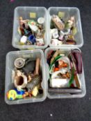 Four plastic tubs containing miscellaneous including 20th century pottery and glassware,