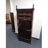 A continental stained beech office cabinet