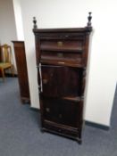 A continental stained beech office cabinet