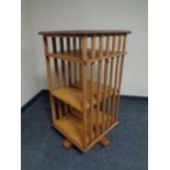 An Edwardian oak revolving bookcase