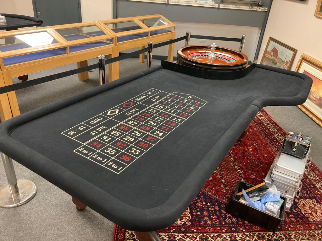 A full size roulette table, length 275 cm width 150 cm, together with a Blackjack table,