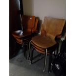 Seven plywood mid century chairs