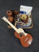 A box containing miscellaneous including anniversary clock, candlesticks, Elvis Presley guitar,