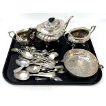 A three piece silver plated tea service together with a continental white metal bowl and a quantity