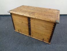 A 19th century pine trunk with metal mounts