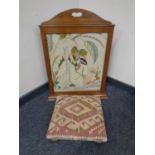 An oak framed tapestry Art Nouveau fire screen decorated with Haires together with a further
