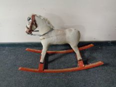 A small antique rocking horse