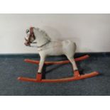 A small antique rocking horse