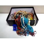A box containing a large quantity of assorted costume jewellery,