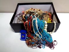 A box containing a large quantity of assorted costume jewellery,