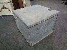 A large galvanised lidded container