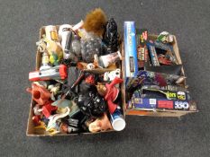 Three boxes containing a large quantity of Star Wars action figures, puzzles,