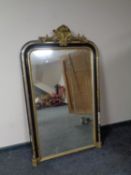 A Victorian ebonised and gilt mirror (as found)