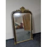 A Victorian ebonised and gilt mirror (as found)