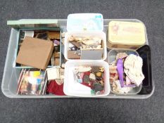 A box containing a collection of doll's furniture and accessories