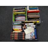 Three boxes containing books, reference guides,