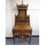 A 19th century inlaid mahogany side cabinet fitted with two drawers,