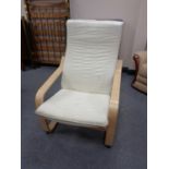 A beech framed Ikea relaxer chair