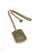 A 9ct gold pendant suspended on chain, 7.