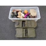 Two plastic military model vehicles together with a further plastic crate containing further toys