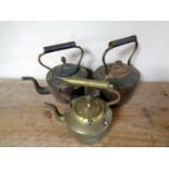 Three antique copper and brass kettles