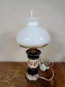 An Italian ceramic lamp with glass shade and matching ash tray